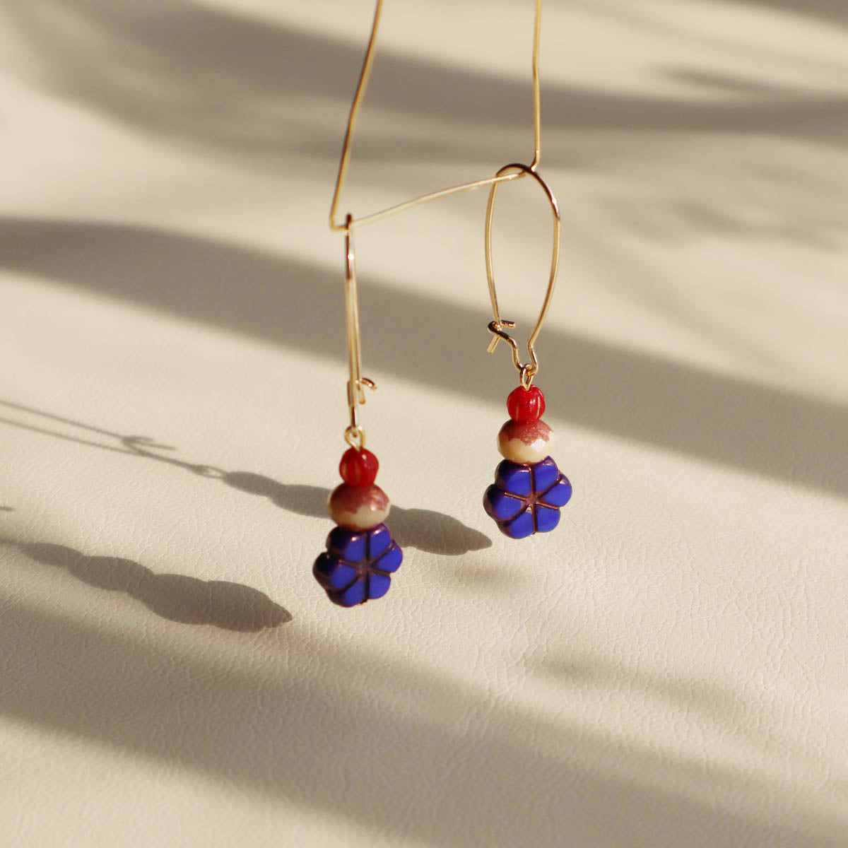 Blue Flower Beaded Earrings – Champagne and Red Beads