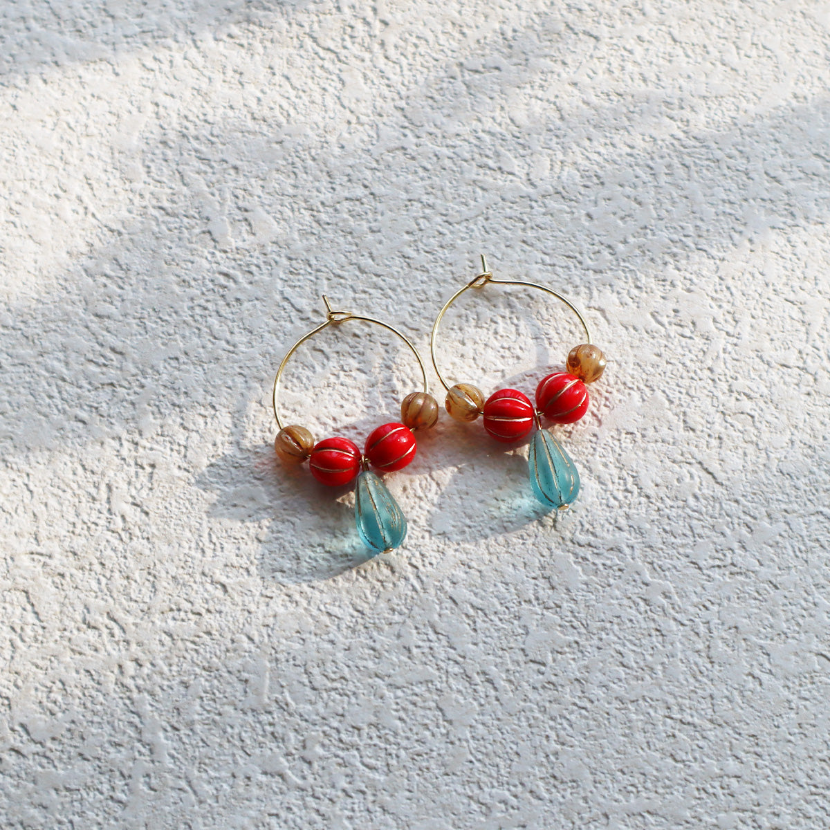 Blue Pendant Bead Hoop Earrings – Red and Brown Beads