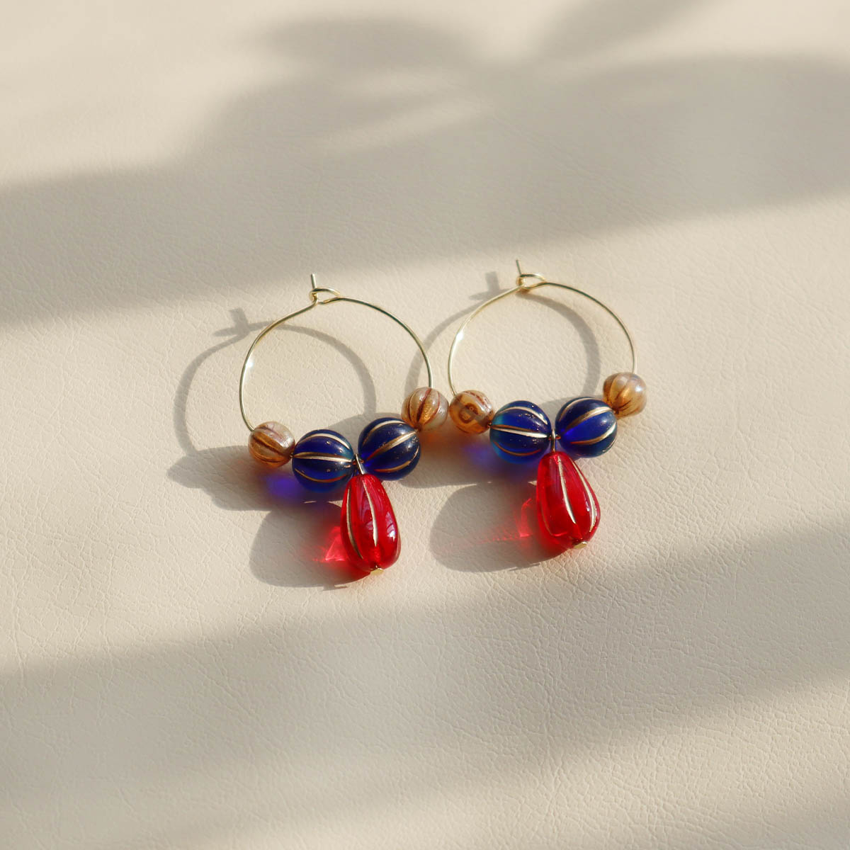 Red Pendant Beaded Hoop Earrings – Blue and Brown Beads